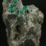 Beryl (variety emerald), Calcite<br />La Pita mining district, Municipio Maripí, Western Emerald Belt, Boyacá Department, Colombia<br />75x55x90mm<br /> (Author: Fiebre Verde)