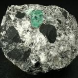 Beryl (variety emerald), Calcite, Pyrite<br />Muzo mining district, La Pava Mine, Quípama, Municipio Muzo, Western Emerald Belt, Boyacá Department, Colombia<br />xl=7mm<br /> (Author: Fiebre Verde)