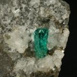 Beryl (variety emerald), Calcite, Pyrite<br />Chivor mining district, Municipio Chivor, Eastern Emerald Belt, Boyacá Department, Colombia<br />Detail - xl=9mm<br /> (Author: Fiebre Verde)