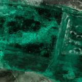 Beryl (variety emerald), Calcite<br />La Pita mining district, Municipio Maripí, Western Emerald Belt, Boyacá Department, Colombia<br />40mm across, xl=15mm<br /> (Author: Fiebre Verde)