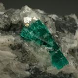 Beryl (variety emerald), Calcite, Pyrite, Quartz<br />La Pita mining district, Municipio Maripí, Western Emerald Belt, Boyacá Department, Colombia<br />60x35mm, main xl=16mm<br /> (Author: Fiebre Verde)