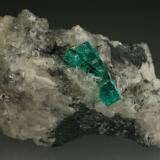 Beryl (variety emerald), Calcite, Pyrite, Quartz<br />La Pita mining district, Municipio Maripí, Western Emerald Belt, Boyacá Department, Colombia<br />60x35mm, main xl=16mm<br /> (Author: Fiebre Verde)