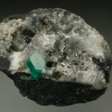 Beryl (variety emerald), Calcite, Pyrite<br />Chivor mining district, Municipio Chivor, Eastern Emerald Belt, Boyacá Department, Colombia<br />35x45mm, xl=6mm<br /> (Author: Fiebre Verde)