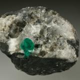 Beryl (variety emerald), Calcite, Pyrite<br />Chivor mining district, Municipio Chivor, Eastern Emerald Belt, Boyacá Department, Colombia<br />35x45mm, xl=6mm<br /> (Author: Fiebre Verde)