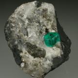 Beryl (variety emerald), Calcite, Pyrite<br />Chivor mining district, Municipio Chivor, Eastern Emerald Belt, Boyacá Department, Colombia<br />35x45mm, xl=6mm<br /> (Author: Fiebre Verde)