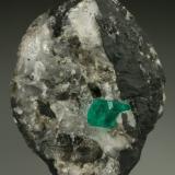 Beryl (variety emerald), Calcite, Pyrite<br />Chivor mining district, Municipio Chivor, Eastern Emerald Belt, Boyacá Department, Colombia<br />35x45mm, xl=6mm<br /> (Author: Fiebre Verde)