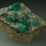 Beryl (variety emerald), Calcite, Pyrite<br />Chivor mining district, Municipio Chivor, Eastern Emerald Belt, Boyacá Department, Colombia<br />42x48x20mm<br /> (Author: Fiebre Verde)