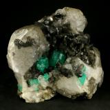 Beryl (variety emerald), Calcite<br />Coscuez mining district, Municipio San Pablo de Borbur, Western Emerald Belt, Boyacá Department, Colombia<br />125x125x85mm<br /> (Author: Fiebre Verde)