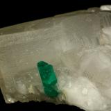 Beryl (variety emerald), Calcite<br />Coscuez mining district, Municipio San Pablo de Borbur, Western Emerald Belt, Boyacá Department, Colombia<br />xl=10mm<br /> (Author: Fiebre Verde)