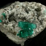 Beryl (variety emerald), Calcite, Pyrite<br />Chivor mining district, El Oriente Mine, Municipio Chivor, Eastern Emerald Belt, Boyacá Department, Colombia<br />55x35x32mm<br /> (Author: Fiebre Verde)