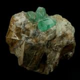 Beryl (variety emerald), Calcite<br />Chivor mining district, Municipio Chivor, Eastern Emerald Belt, Boyacá Department, Colombia<br />52mm across<br /> (Author: Fiebre Verde)