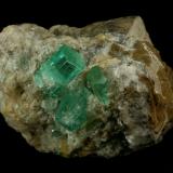 Beryl (variety emerald), Calcite<br />Chivor mining district, Municipio Chivor, Eastern Emerald Belt, Boyacá Department, Colombia<br />52mm across<br /> (Author: Fiebre Verde)