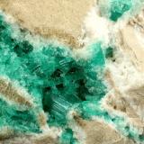 Beryl (variety emerald), Calcite<br />Chivor mining district, Municipio Chivor, Eastern Emerald Belt, Boyacá Department, Colombia<br />Detail<br /> (Author: Fiebre Verde)