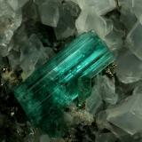 Beryl (variety emerald), Calcite, Pyrite<br />Chivor mining district, Municipio Chivor, Eastern Emerald Belt, Boyacá Department, Colombia<br />40x42x42mm, xl=18mm<br /> (Author: Fiebre Verde)