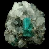 Beryl (variety emerald), Calcite, Pyrite<br />Chivor mining district, Municipio Chivor, Eastern Emerald Belt, Boyacá Department, Colombia<br />40x42x42mm, xl=18mm<br /> (Author: Fiebre Verde)