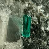 Beryl (variety emerald), Calcite, Pyrite<br />Coscuez mining district, Municipio San Pablo de Borbur, Western Emerald Belt, Boyacá Department, Colombia<br />43x38x50mm,  xl=11mm<br /> (Author: Fiebre Verde)