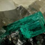 Beryl (variety emerald), Calcite<br />La Pita mining district, Municipio Maripí, Western Emerald Belt, Boyacá Department, Colombia<br />9cm across, xls=20mm<br /> (Author: Fiebre Verde)