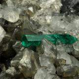 Beryl (variety emerald), Calcite, Pyrite<br />Chivor mining district, Municipio Chivor, Eastern Emerald Belt, Boyacá Department, Colombia<br />65x50x70mm, xl=18mm<br /> (Author: Fiebre Verde)