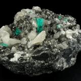 Beryl (variety emerald), Calcite, Pyrite<br />Coscuez mining district, Municipio San Pablo de Borbur, Western Emerald Belt, Boyacá Department, Colombia<br />95x75x75mm, xl=15mm<br /> (Author: Fiebre Verde)