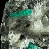 Beryl (variety emerald), Calcite<br />La Pita mining district, Municipio Maripí, Western Emerald Belt, Boyacá Department, Colombia<br />100x50x70mm, largest xl=17mm<br /> (Author: Fiebre Verde)