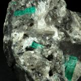 Beryl (variety emerald), Calcite<br />La Pita mining district, Municipio Maripí, Western Emerald Belt, Boyacá Department, Colombia<br />100x50x70mm, largest xl=17mm<br /> (Author: Fiebre Verde)