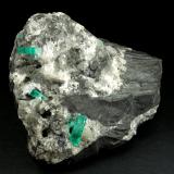 Beryl (variety emerald), Calcite<br />La Pita mining district, Municipio Maripí, Western Emerald Belt, Boyacá Department, Colombia<br />100x50x70mm, largest xl=17mm<br /> (Author: Fiebre Verde)