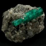 Beryl (variety emerald), Calcite<br />La Pita mining district, Polveros Mine, Municipio Maripí, Western Emerald Belt, Boyacá Department, Colombia<br />37x45mm, xl=34mm<br /> (Author: Fiebre Verde)