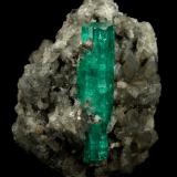 Beryl (variety emerald), Calcite<br />La Pita mining district, Polveros Mine, Municipio Maripí, Western Emerald Belt, Boyacá Department, Colombia<br />37x45mm, xl=34mm<br /> (Author: Fiebre Verde)