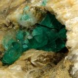 Beryl (variety emerald), Calcite<br />Peñas Blancas Mine, Municipio San Pablo de Borbur, Western Emerald Belt, Boyacá Department, Colombia<br />78x47x31mm - Detail<br /> (Author: Fiebre Verde)