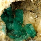 Beryl (variety emerald), Calcite<br />Peñas Blancas Mine, Municipio San Pablo de Borbur, Western Emerald Belt, Boyacá Department, Colombia<br />78x47x31mm - Detail<br /> (Author: Fiebre Verde)