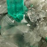 Beryl (variety emerald), Calcite, Quartz<br />La Pita mining district, Polveros Mine, Municipio Maripí, Western Emerald Belt, Boyacá Department, Colombia<br />53x51x40mm, xl=9mm<br /> (Author: Fiebre Verde)