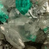 Beryl (variety emerald), Calcite, Quartz<br />La Pita mining district, Polveros Mine, Municipio Maripí, Western Emerald Belt, Boyacá Department, Colombia<br />53x51x40mm, xl=9mm<br /> (Author: Fiebre Verde)