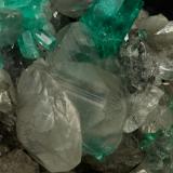 Beryl (variety emerald), Calcite, Quartz<br />La Pita mining district, Polveros Mine, Municipio Maripí, Western Emerald Belt, Boyacá Department, Colombia<br />53x51x40mm, xl=9mm<br /> (Author: Fiebre Verde)