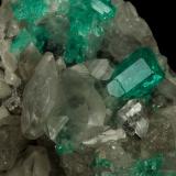 Beryl (variety emerald), Calcite, Quartz<br />La Pita mining district, Polveros Mine, Municipio Maripí, Western Emerald Belt, Boyacá Department, Colombia<br />53x51x40mm, xl=9mm<br /> (Author: Fiebre Verde)