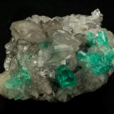 Beryl (variety emerald), Calcite, Quartz<br />La Pita mining district, Polveros Mine, Municipio Maripí, Western Emerald Belt, Boyacá Department, Colombia<br />53x51x40mm, xl=9mm<br /> (Author: Fiebre Verde)