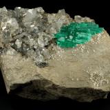 Beryl (variety emerald), Calcite, Pyrite, Albite<br />Chivor mining district, Municipio Chivor, Eastern Emerald Belt, Boyacá Department, Colombia<br />85x65x40mm, cluster=32x19mm<br /> (Author: Fiebre Verde)