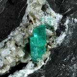 Beryl (variety emerald), Calcite<br />La Pita mining district, Polveros Mine, Municipio Maripí, Western Emerald Belt, Boyacá Department, Colombia<br />115x75x115mm, xl=20mm<br /> (Author: Fiebre Verde)