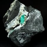 Beryl (variety emerald), Calcite<br />La Pita mining district, Polveros Mine, Municipio Maripí, Western Emerald Belt, Boyacá Department, Colombia<br />115x75x115mm, xl=20mm<br /> (Author: Fiebre Verde)