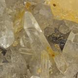 Quartz, Siderite, Rutile<br />Poudrette Quarry, Mont Saint-Hilaire, La Vallée-du-Richelieu RCM, Montérégie, Québec, Canada<br />FOV = 4mm<br /> (Author: Doug)