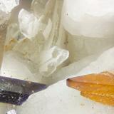 Stontionite, Titanite, Amphibole Group Mineral<br />Poudrette Quarry, Mont Saint-Hilaire, La Vallée-du-Richelieu RCM, Montérégie, Québec, Canada<br />FOV = 4mm<br /> (Author: Doug)