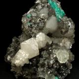 Beryl (variety emerald), Calcite, Fluorite<br />La Pita mining district, Municipio Maripí, Western Emerald Belt, Boyacá Department, Colombia<br />170x120x95mm, aggregate=50x22mm<br /> (Author: Fiebre Verde)