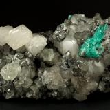 Beryl (variety emerald), Calcite, Fluorite<br />La Pita mining district, Municipio Maripí, Western Emerald Belt, Boyacá Department, Colombia<br />170x120x95mm, aggregate=50x22mm<br /> (Author: Fiebre Verde)