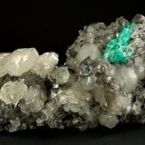 Beryl (variety emerald), Calcite, Fluorite<br />La Pita mining district, Municipio Maripí, Western Emerald Belt, Boyacá Department, Colombia<br />170x120x95mm, aggregate=50x22mm<br /> (Author: Fiebre Verde)