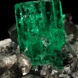 Beryl (variety emerald), Calcite<br />La Pita mining district, Municipio Maripí, Western Emerald Belt, Boyacá Department, Colombia<br />83x27x62mm, xl=9mm<br /> (Author: Fiebre Verde)