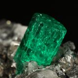 Beryl (variety emerald), Calcite<br />La Pita mining district, Municipio Maripí, Western Emerald Belt, Boyacá Department, Colombia<br />83x27x62mm, xl=9mm<br /> (Author: Fiebre Verde)