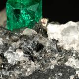 Beryl (variety emerald), Calcite<br />La Pita mining district, Municipio Maripí, Western Emerald Belt, Boyacá Department, Colombia<br />83x27x62mm, xl=9mm<br /> (Author: Fiebre Verde)