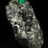 Beryl (variety emerald), Calcite<br />La Pita mining district, Municipio Maripí, Western Emerald Belt, Boyacá Department, Colombia<br />83x27x62mm, xl=9mm<br /> (Author: Fiebre Verde)