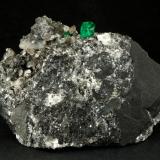 Beryl (variety emerald), Calcite<br />La Pita mining district, Municipio Maripí, Western Emerald Belt, Boyacá Department, Colombia<br />83x27x62mm, xl=9mm<br /> (Author: Fiebre Verde)