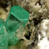 Beryl (variety emerald), Calcite, Aragonite<br />Chivor mining district, Municipio Chivor, Eastern Emerald Belt, Boyacá Department, Colombia<br />75x55x65mm, main xl~1cm<br /> (Author: Fiebre Verde)