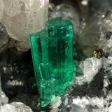 Beryl (variety emerald), Calcite, Pyrite<br />La Pita mining district, Municipio Maripí, Western Emerald Belt, Boyacá Department, Colombia<br />54x36x60mm, xl=8mm<br /> (Author: Fiebre Verde)